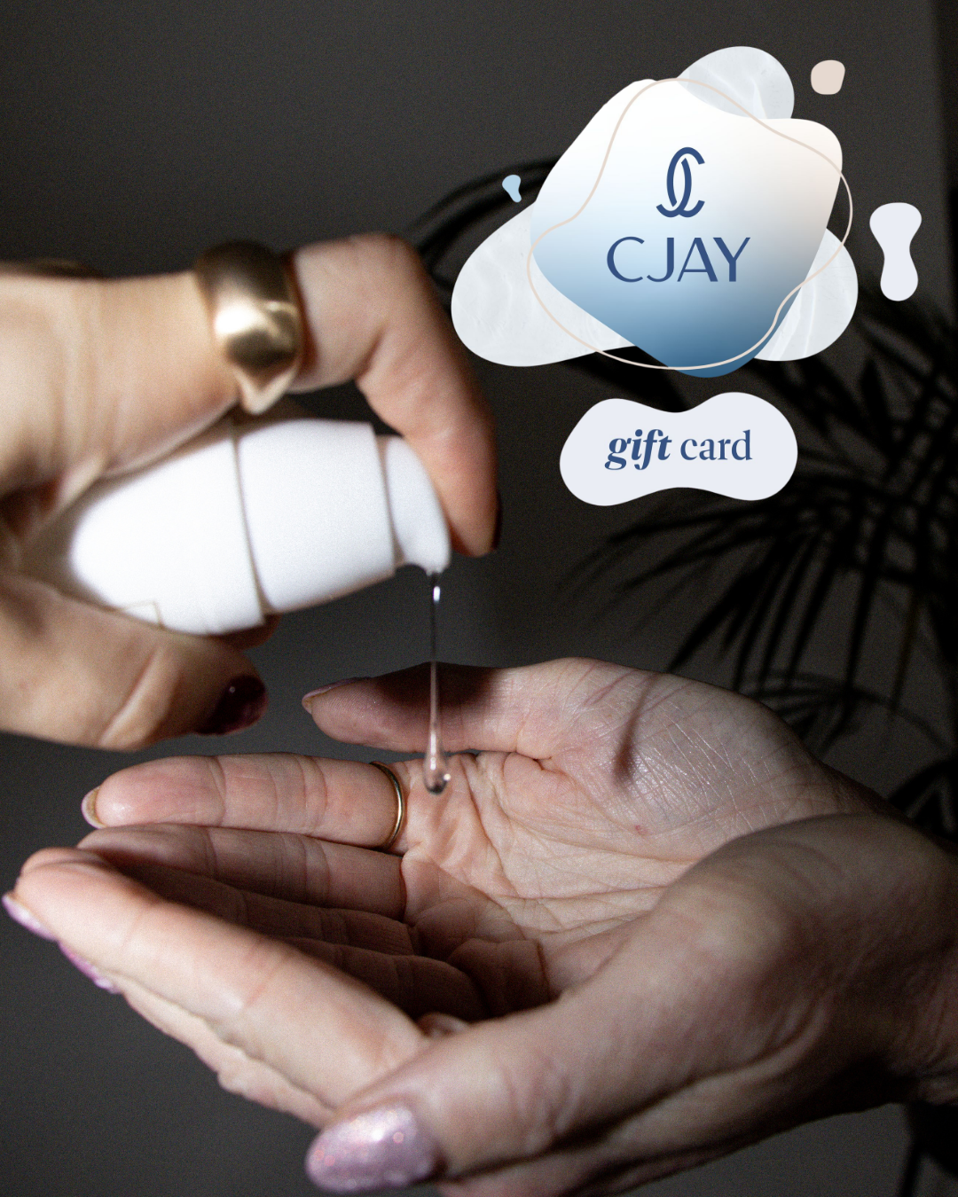 Person pouring a small amount of liquid into another hand with a CJAY gift card overlay.